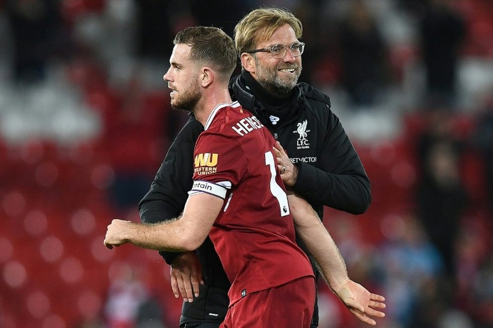 Jordan Henderson could make a return to the first team, after being benched against United. AFP