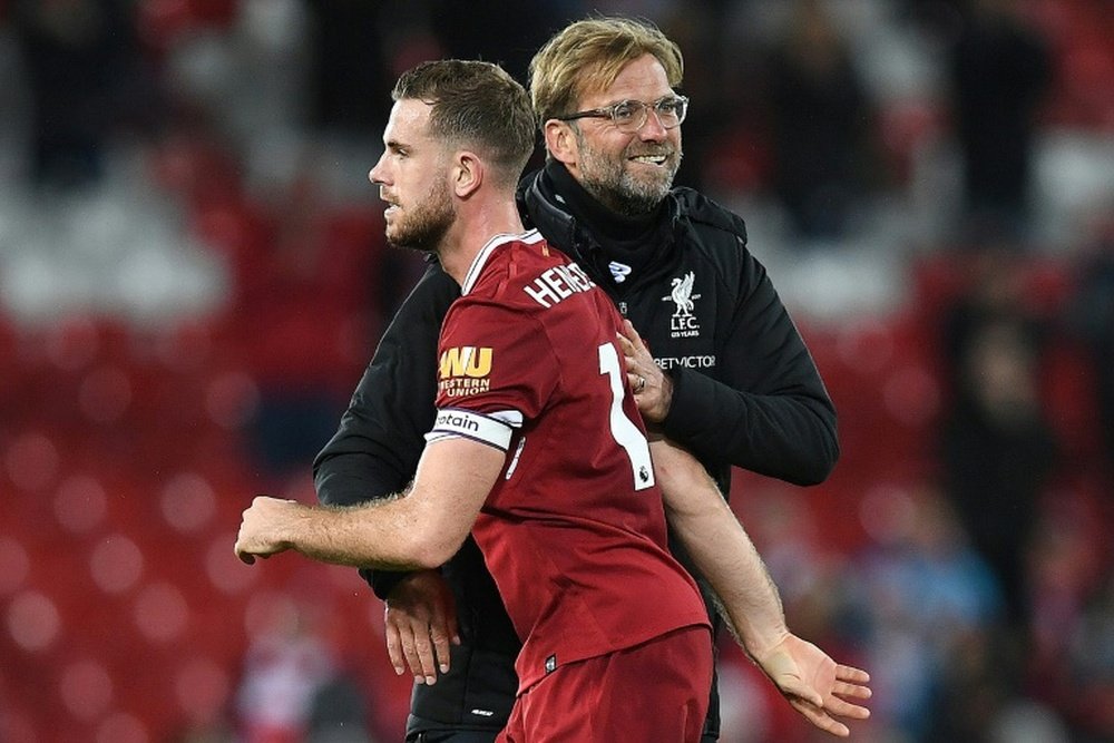 Liverpool's Henderson trains again. AFP