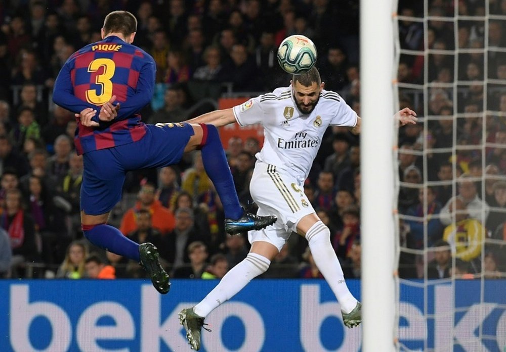 Barça y Madrid podrían coincidir ya en octavos. AFP/Archivo