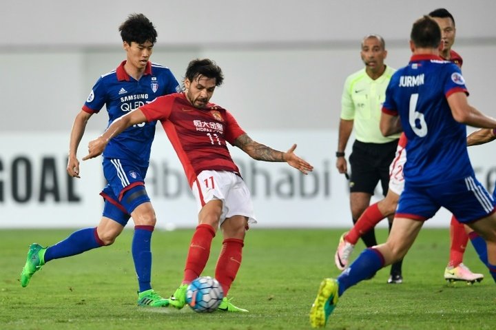 Goulart double puts Evergrande into knock-outs