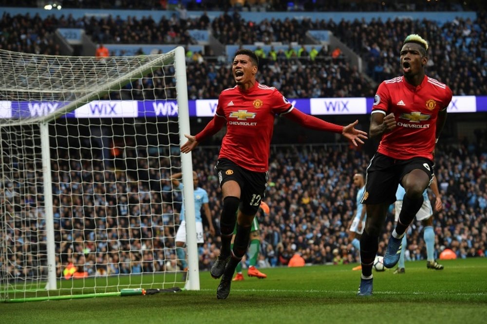 Chris Smalling completed an incredible comeback as United beat City 3-2 last season. AFP