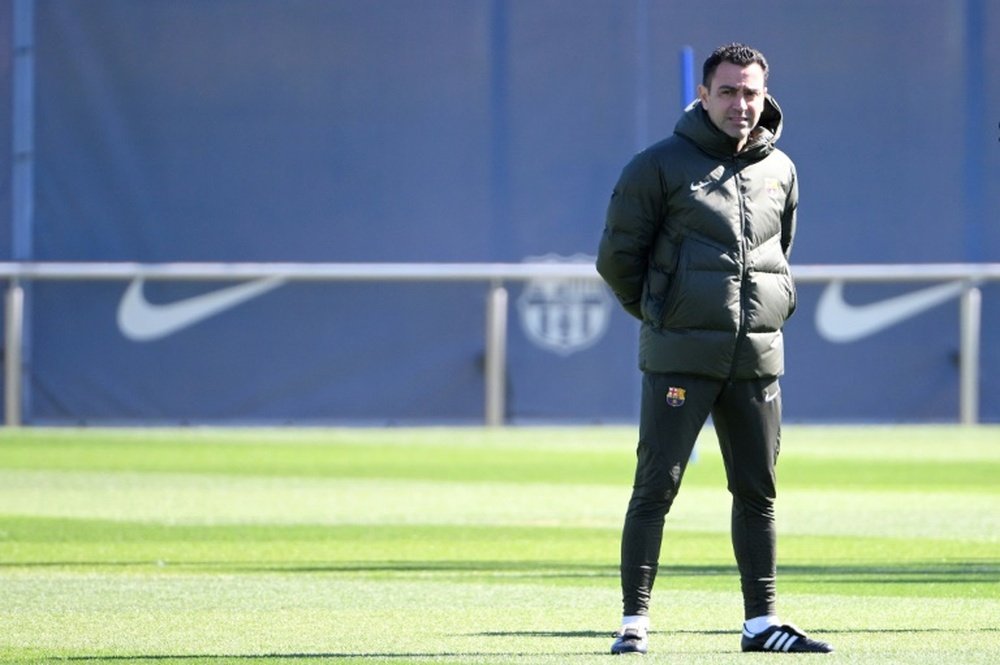 Xavi will return to his position for the La Liga matchday 32 fixture against Madrid. AFP
