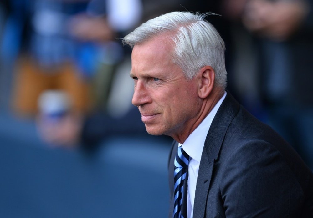 Pardew is under fire after a poor start to the season at Crystal Palace. AFP