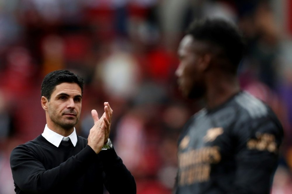 Arsenal are in second place after losing 1-4 to Manchester City. AFP