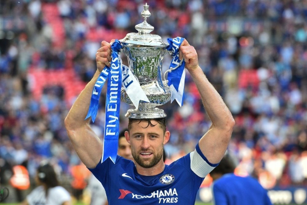 Gary Cahill with the FA Cup. AFP