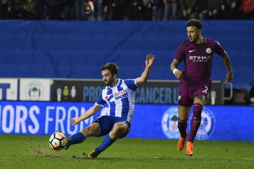 Grigg scored in Wigan's victory over City. AFP