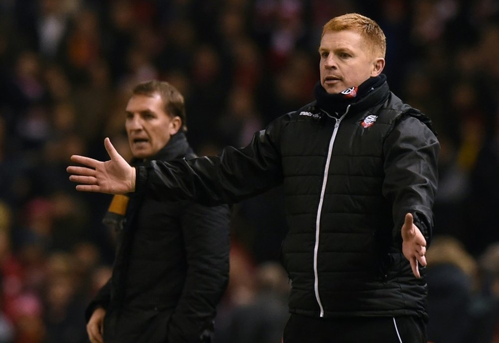 Rodgers and Lennon pictured during a FA Cup clash between Bolton and Liverpool. AFP