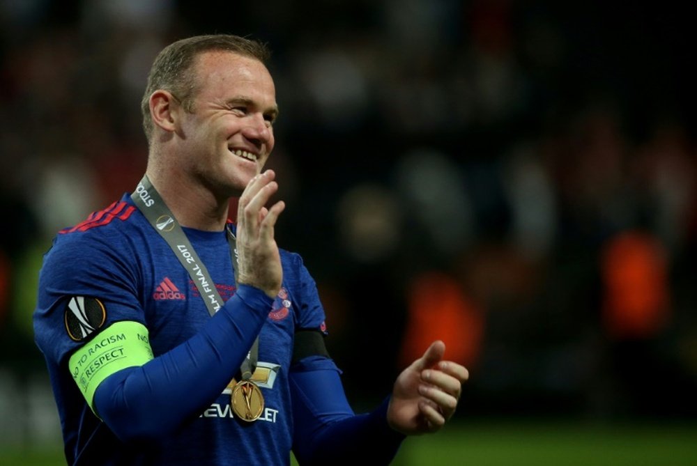 Wayne Rooney podría volver a la que fue su casa en cuestión de horas. AFP/Archivo
