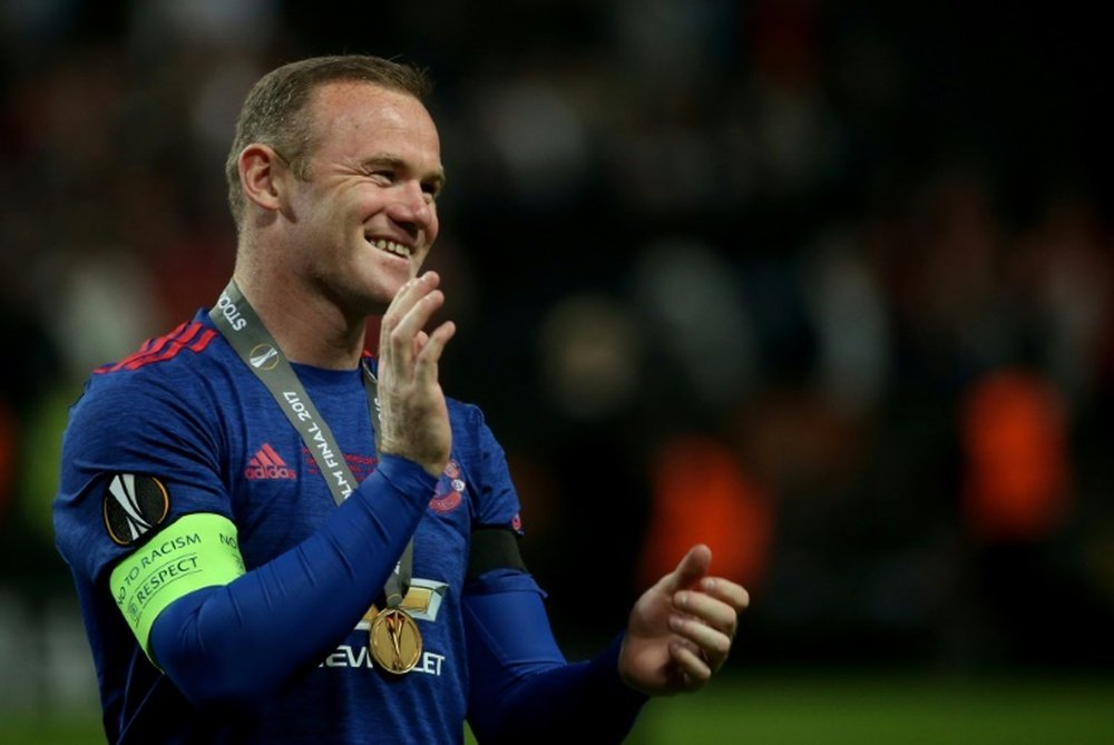 Wayne Rooney will take a pay cut to join Everton. AFP