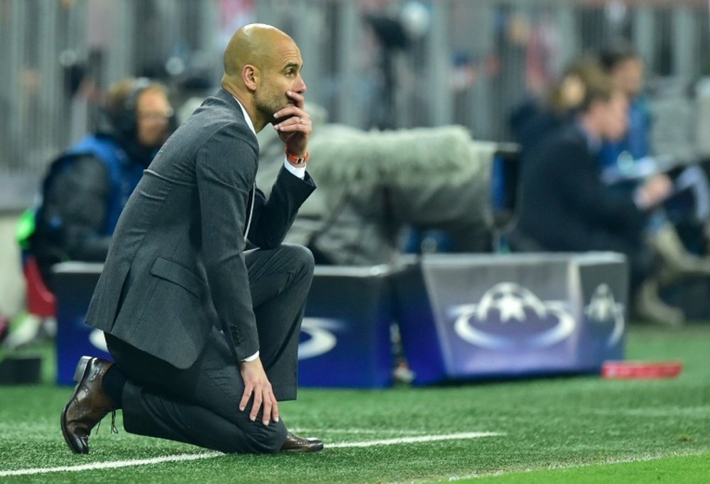 Bayern Munichs head coach Pep Guardiola follows the action during their UEFA Champions League semi-final, second-leg match against Atletico Madrid, in Munich, on May 3, 2016
