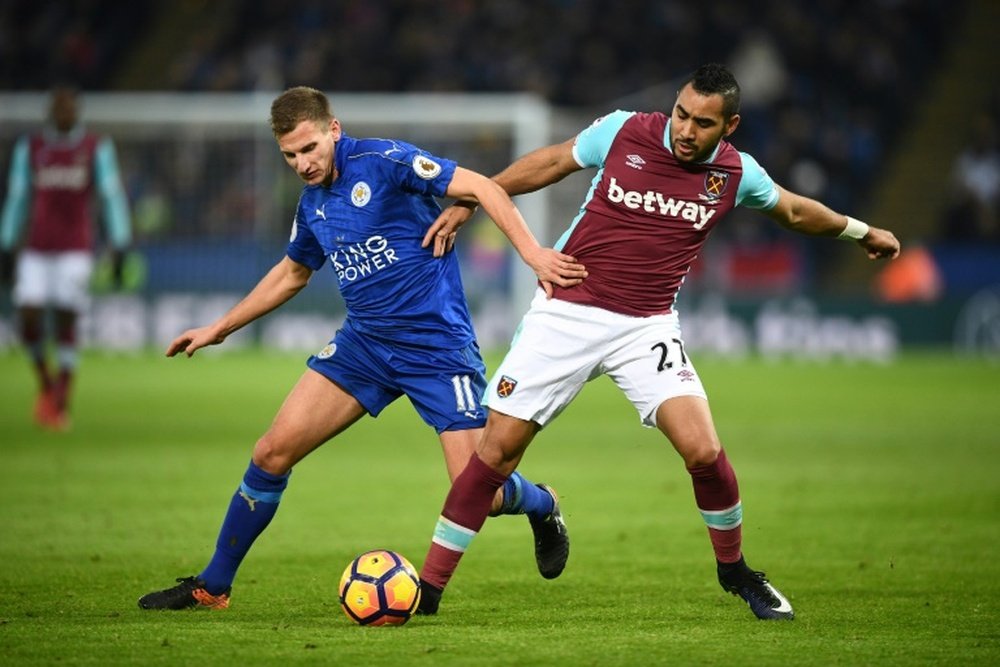 Dimitri Payet fighting for the ball. AFP