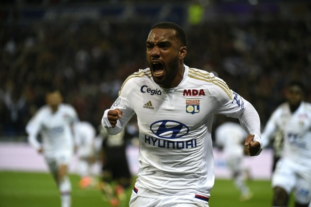 Alexandre Lacazette celebrates a goal for Lyon. BeSoccer