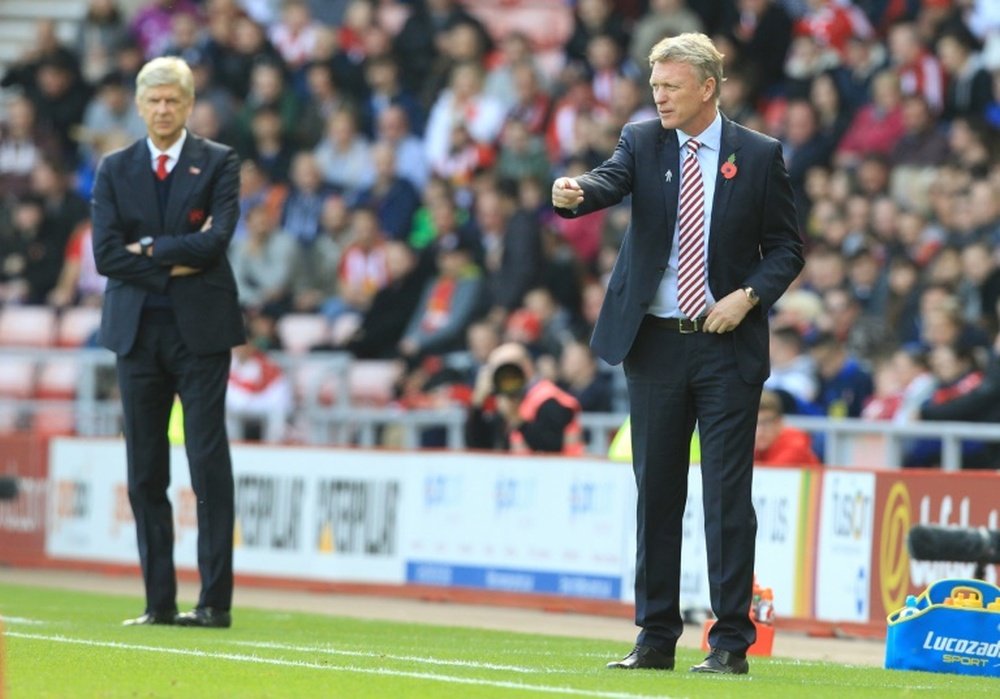 Arsene Wenger and David Moyes will meet on the touchline again on Wednesday. AFP