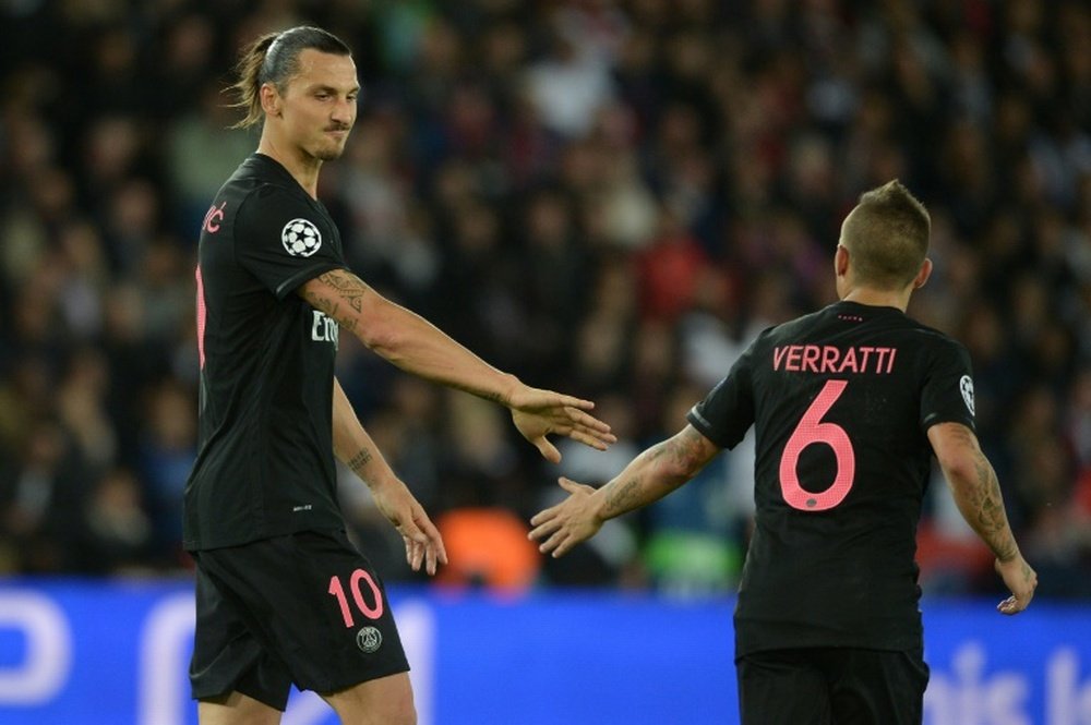 PSGs Zlatan Ibrahimovic (L) and Marco Verratti during the Champions League match against Malmo on September 15, 2015 at the Parc des Princes stadium