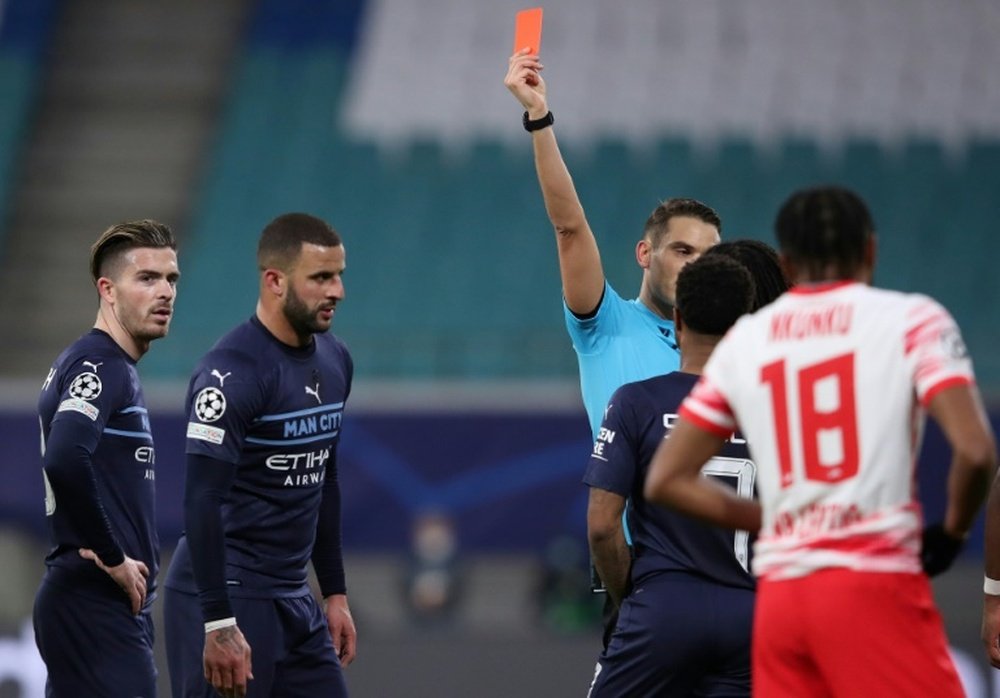 Manchester City defender Kyle Walker (2nd L) is sent off at RB Leipzig. AFP