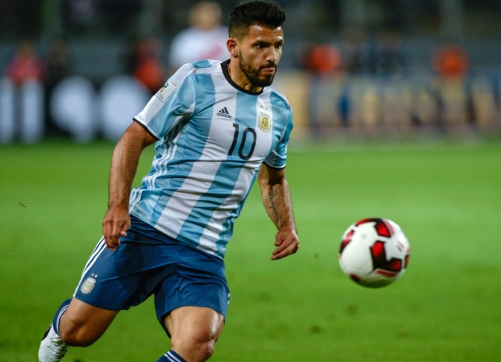 Aguero could miss the games against Italy and Spain. AFP