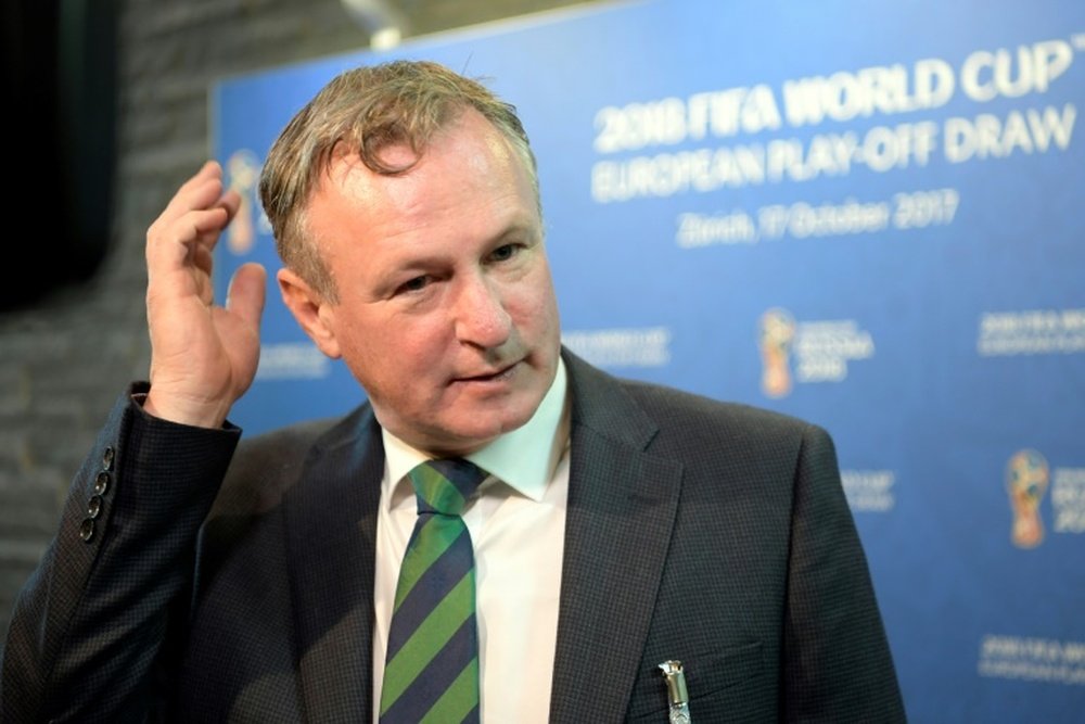 Michael O'Neill podría dejar la Selección de Irlanda del Norte tras caer ante Suiza. AFP/Archivo