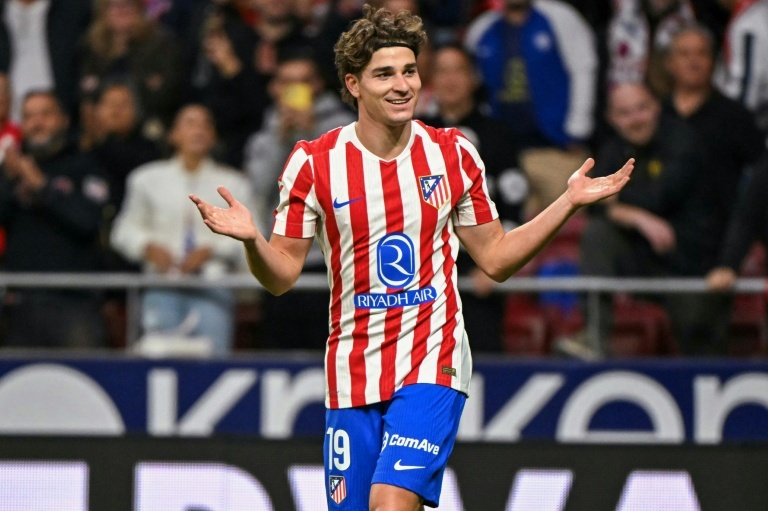 Alvarez hat-trick helps Atletico edge Rayo thriller
