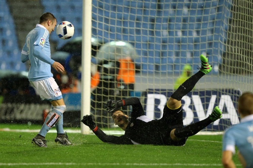 Celta Vigos forward Iago Aspas scores a goal during the Spanish Copa del Rey semi-final second leg football match against Celta Vigo on February 11, 2016