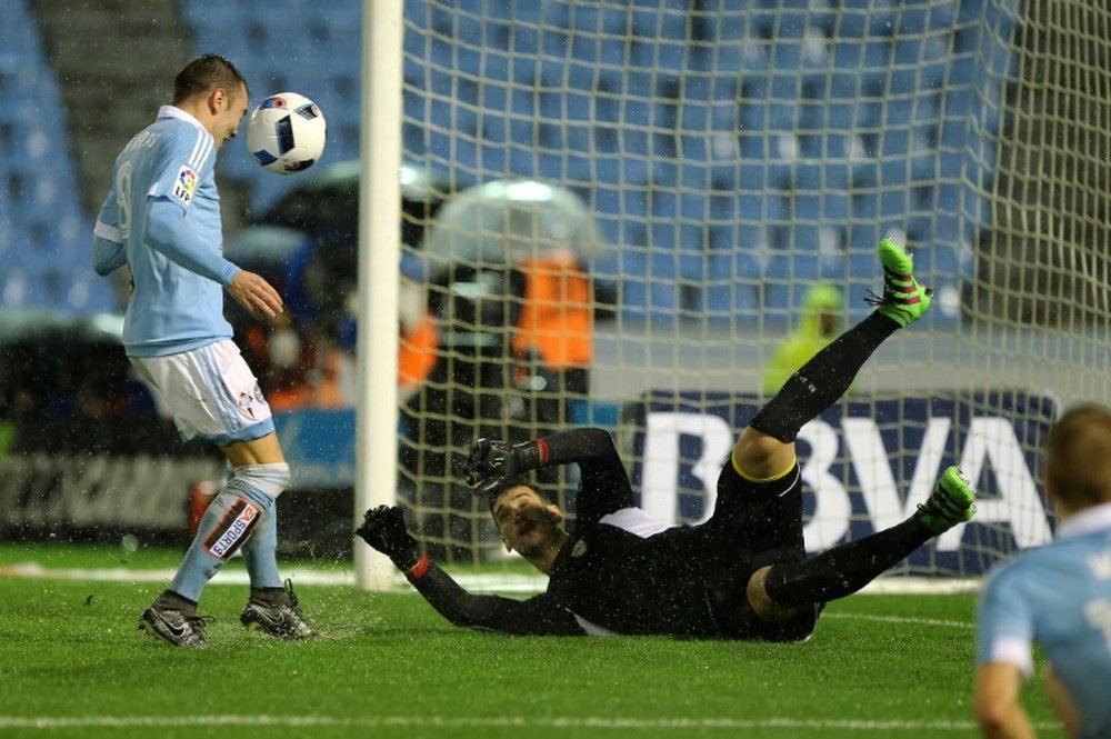 Celta Vigos forward Iago Aspas scores a goal during the Spanish Copa del Rey semi-final second leg football match against Celta Vigo on February 11, 2016