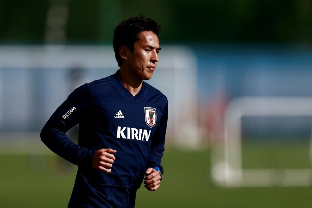 Hasebe says Japan are feeling more confident. AFP