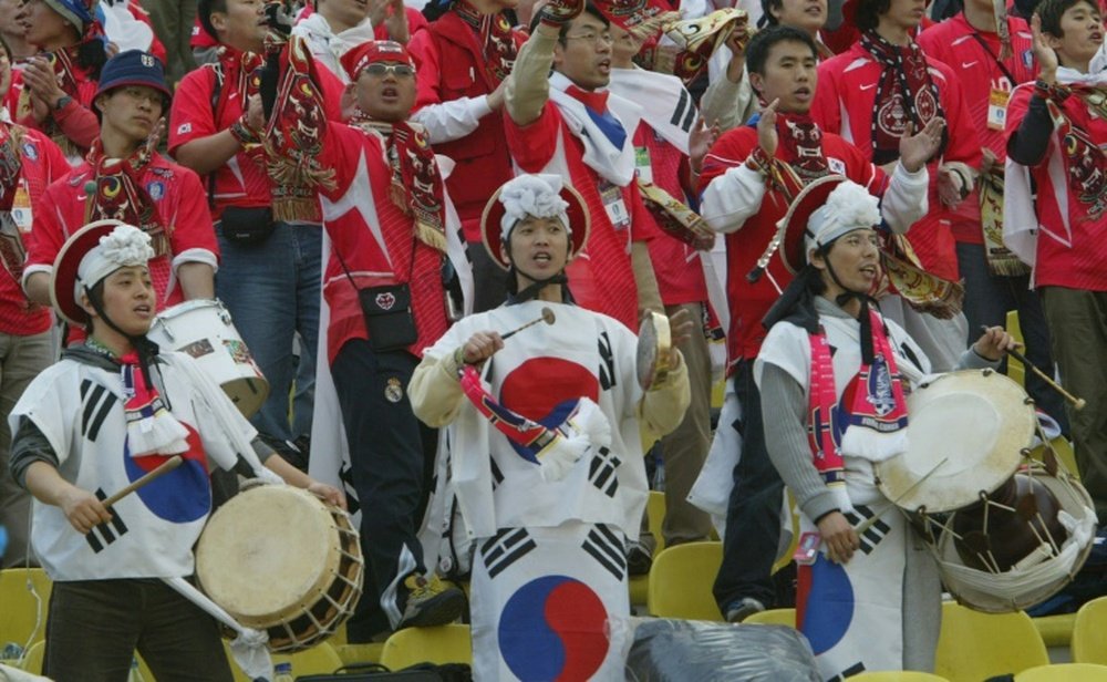 South Korean footbal fans enjoy a match on March 17, 2004