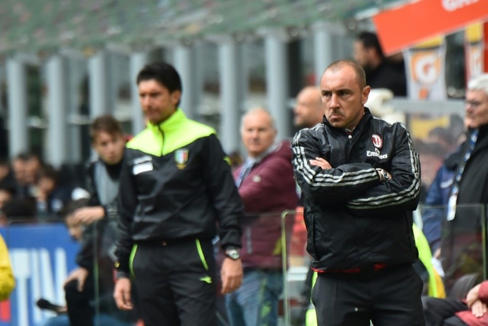 AC Milans coach Cristian Brocchi looks on before the Italian Serie A football match AC Milan vs Frosinone at San Siro Stadium in Milan on May 1, 2016