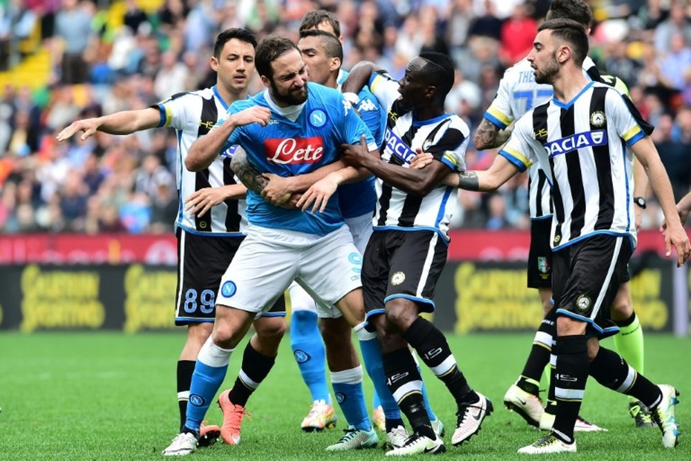 Napolis forward Gonzalo Higuain reacts after he received a red card on April 3, 2016