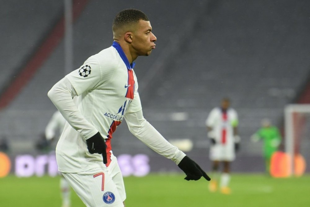Mbappe had holidays until 25th July. AFP