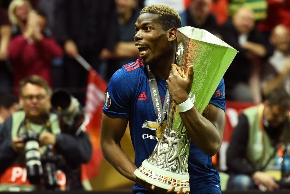 Paul Pogba thinking about the victims of the terror attack after winning Europa League. AFD