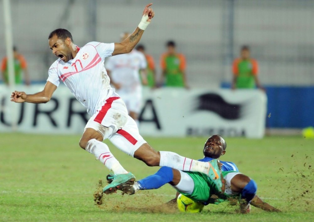 Sierra Leone defender Ibrahim Kargbo (L) has been banned from playing in the Netherlands again
