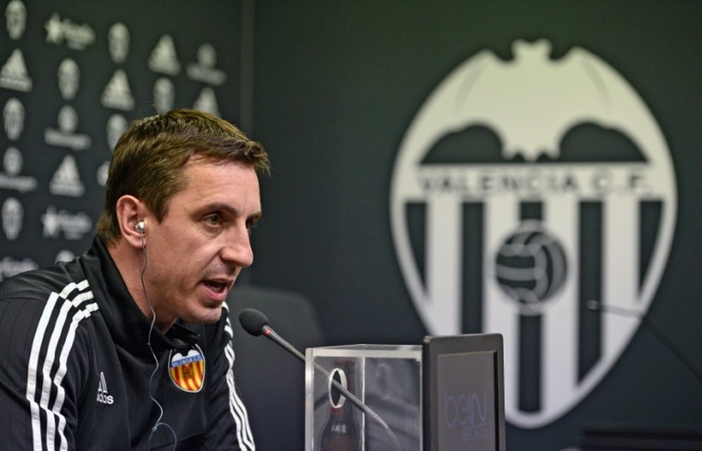 Valencias coach Gary Neville speaks during a press conference in Valencia on February 2, 2016