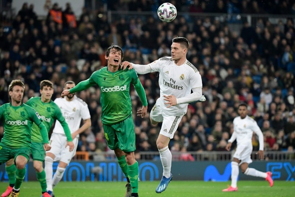 Arsenal will try and buy Jovic (R) if Aubameyang leaves the Gunners. AFP