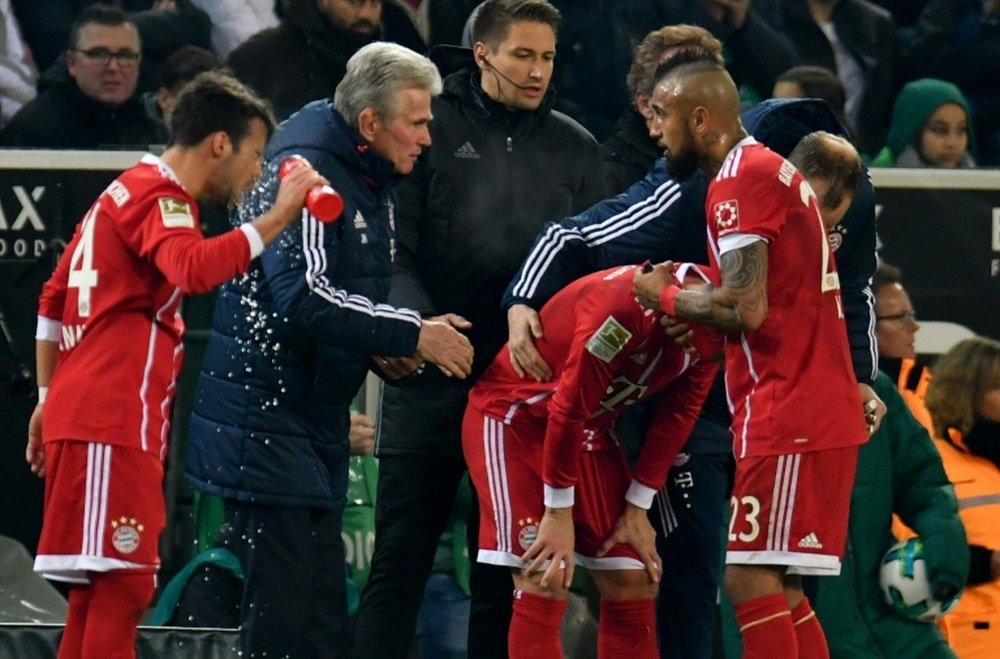 Vidal champions father figure Heynckes with Bayern on brink of title. AFP