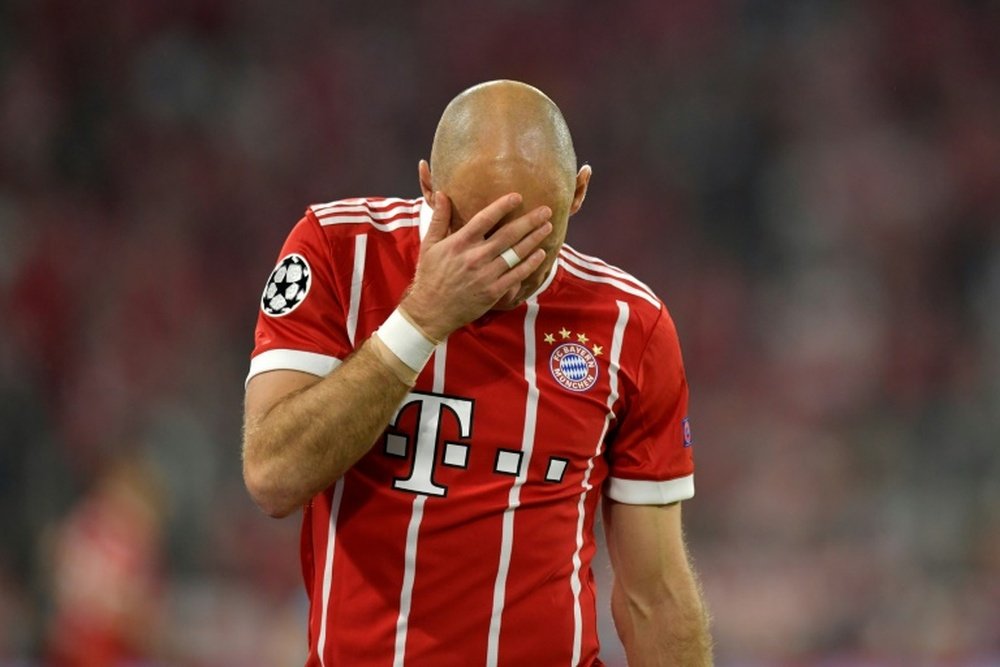 Robben lasted less than 10 minutes. AFP