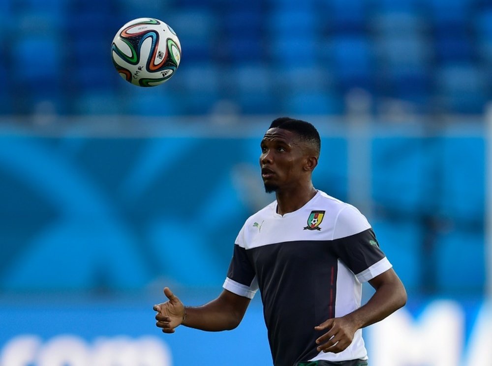 Samuel Etoo plays the ball during a training session at the Das Dunas stadium in Natal. AFP