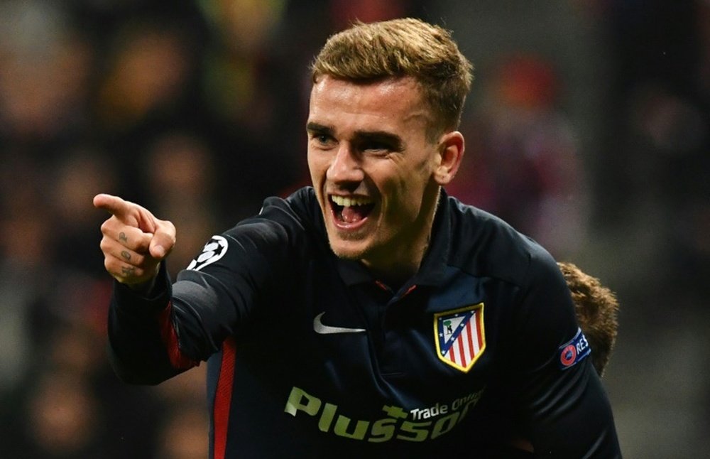 Atletico Madrids forward Antoine Griezmann celebrates scoring during the UEFA Champions League semi-final, second-leg football match between FC Bayern Munich and Atletico Madrid in Munich, southern Germany, on May 3, 2016