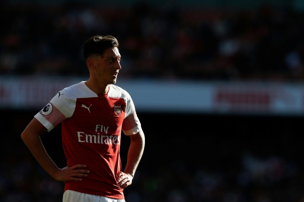 Ozil was absent for the win over North London rivals Totttenham. AFP