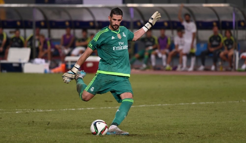 Real Madrid goalkeeper Kiko Casilla scores a goal during the penalty shootout of the International Champions Cup football match between AC Milan and Real Madrid in Shanghai on July 30, 2015