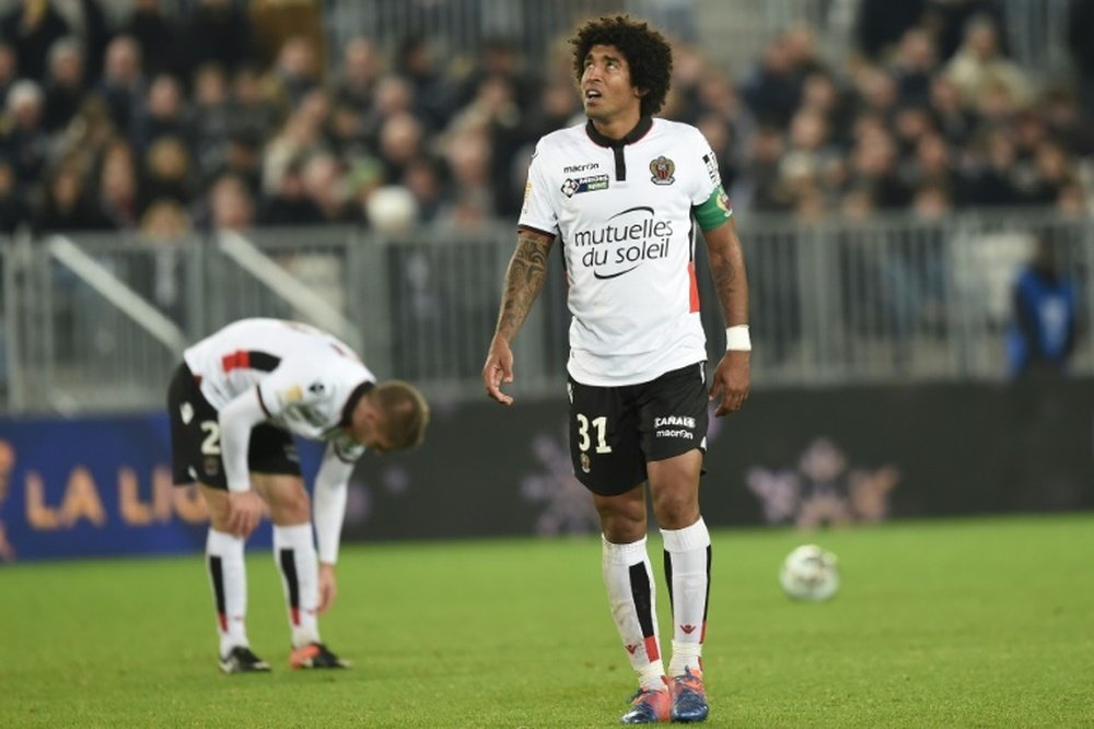 Nice defender Dante reacts (R) during their French League Cup match against Bordeaux. AFP