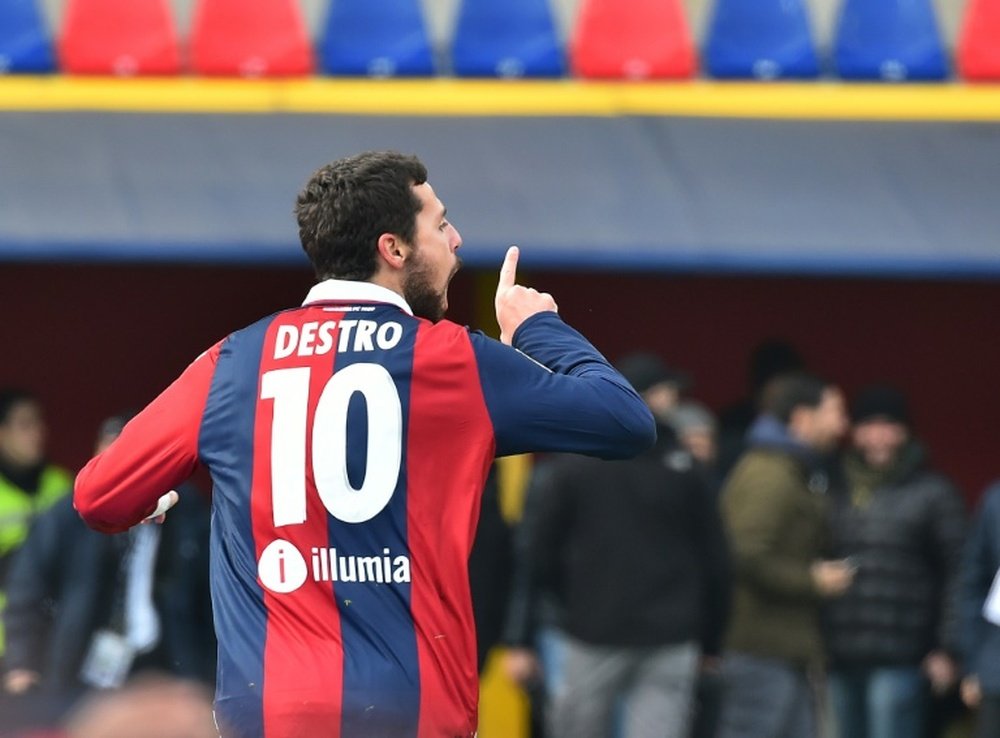 Bologna forward Mattia Destro celebrates after scoring during the Italian Serie A match against Napoli at the DallAra stadium in Bologna, northern Italy on December 6, 2015