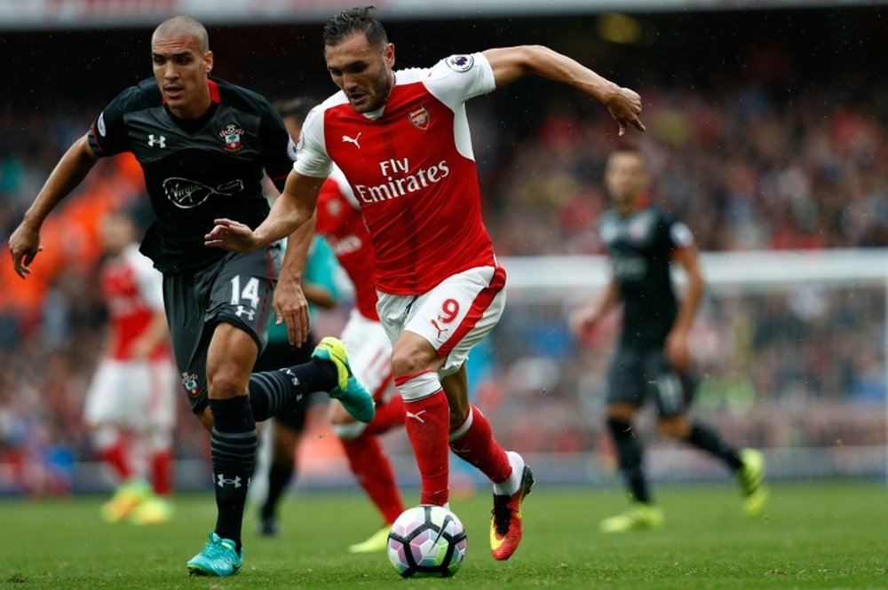 Lucas Perez (R) starts for Arsenal. AFP