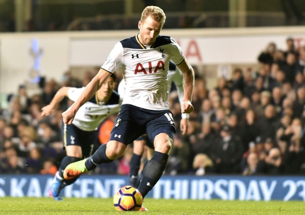 Tottenham Hotspur's Harry Kane scores the opening goal. AFP