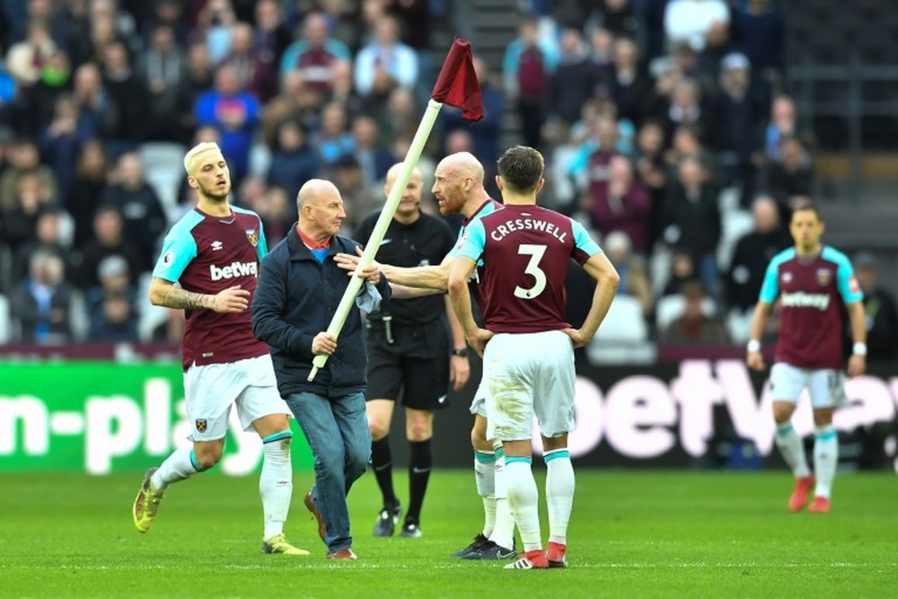 A series of pitch invasions took place during West Ham's game against Burnley. AFP