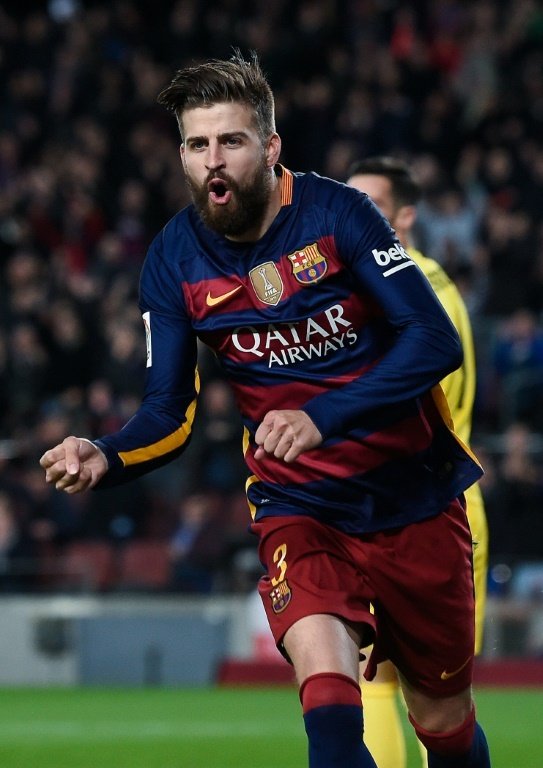 Gerard Piqué célèbre un but au Camp Nou contre Séville. AFP