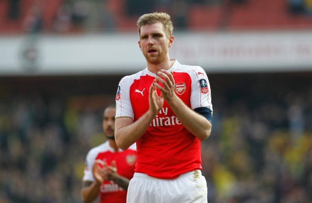 Mertesacker scored on his return to the first team, but Arsenal lost 2-1 to Watford. AFP