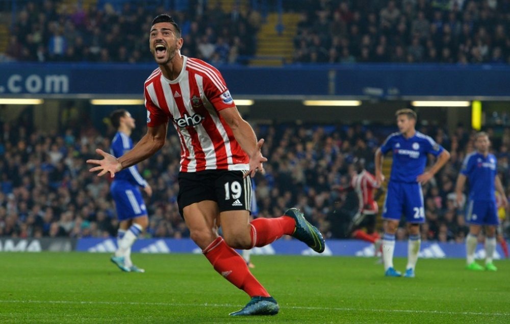Southamptons striker Graziano Pelle celebrates after scoring their third goal during an English Premier League football match against Southampton at Stamford Bridge in London on October 3, 2015