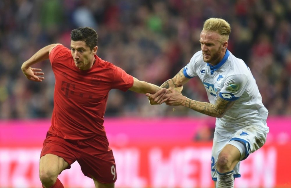 Lewandowski (L) has returned to Munich following his exploits with Poland. AFP