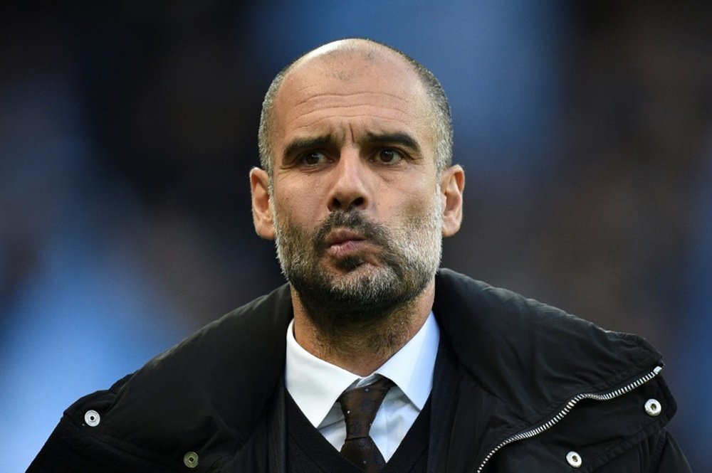 Manchester City veut pouvoir compter sur Guardiola sur du long terme. AFP