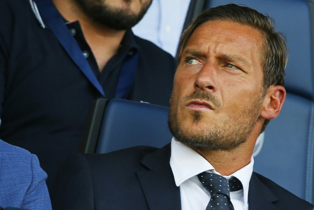 Uma lenda viva do futebol italiano e da Roma: Francesco Totti. AFP